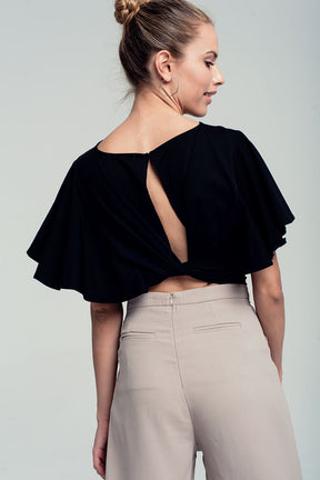 Crop top nero con volant e nodo