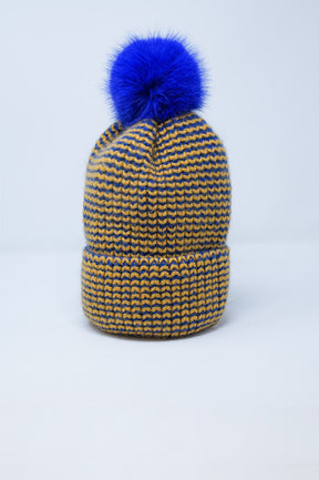 Cuffia a maglia con pompon in blu e giallo