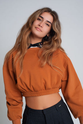 Felpa oversize tagliata in cammello