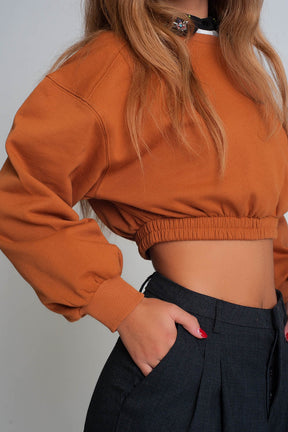 Felpa oversize tagliata in cammello