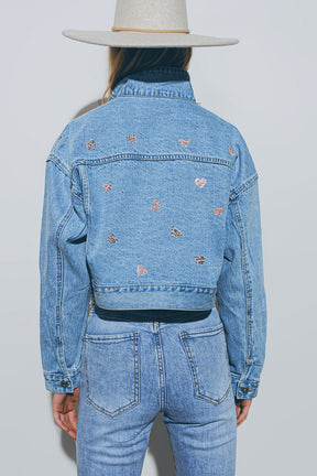 Giacca denim cropped con cuori laminati in lavaggio medio