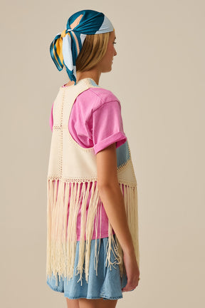 Gilet in ecopelle con dettagli patchwork e frange