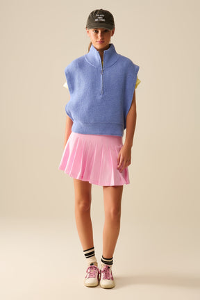 Gilet lavorato a maglia con collo alto a mezza zip e grandi fori per le braccia in blu