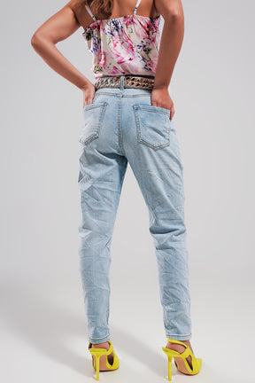 Jeans a vita alta con strappi denim chiaro