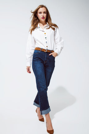 Jeans blu dalla vestibilità rilassata con dettaglio con orli risvoltati