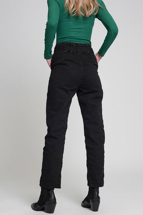 Jeans con vita raccolta e dettagli dei pulsanti neri