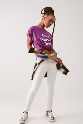 Jeans skinny a vita alta in crema