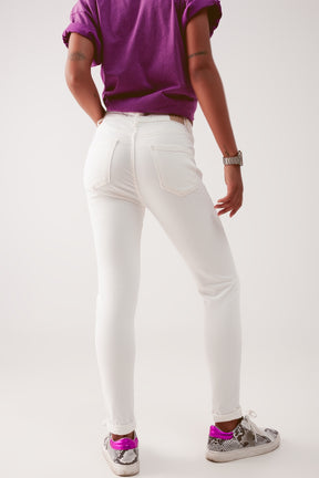 Jeans skinny a vita alta in crema