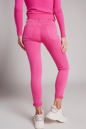 Jeans skinny a vita alta in fucsia