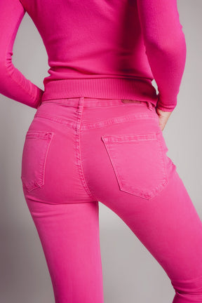 Jeans skinny a vita alta in fucsia