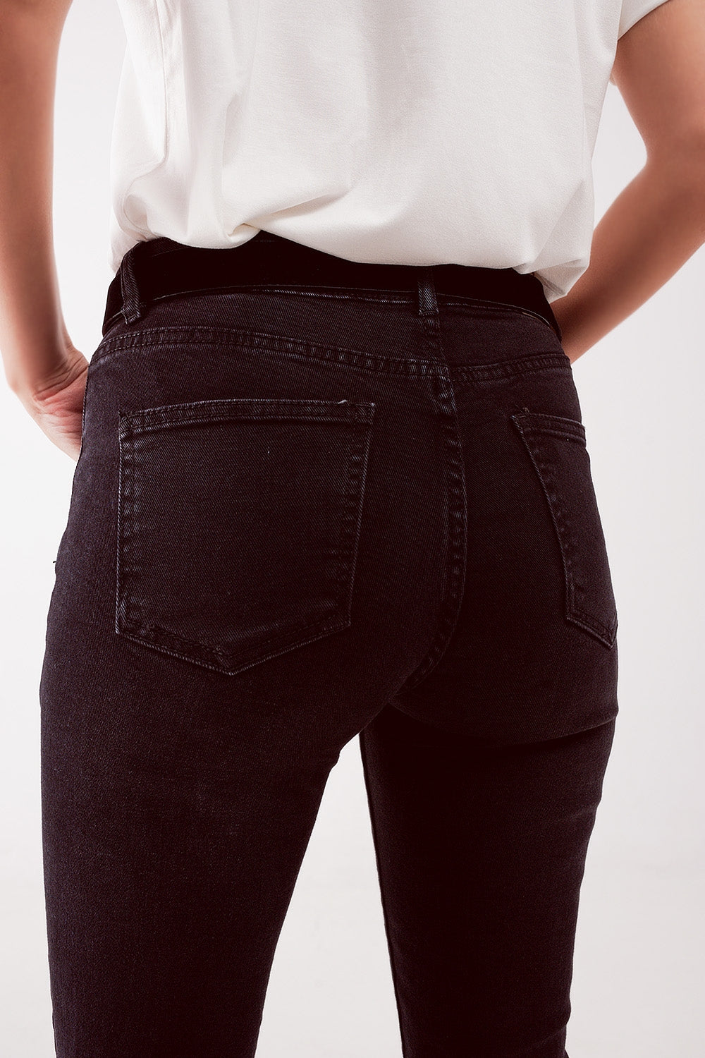 Jeans skinny a vita alta neri con strappi