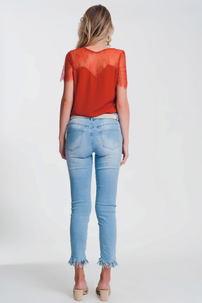 Jeans skinny azzurri  con bordo sfrangiato