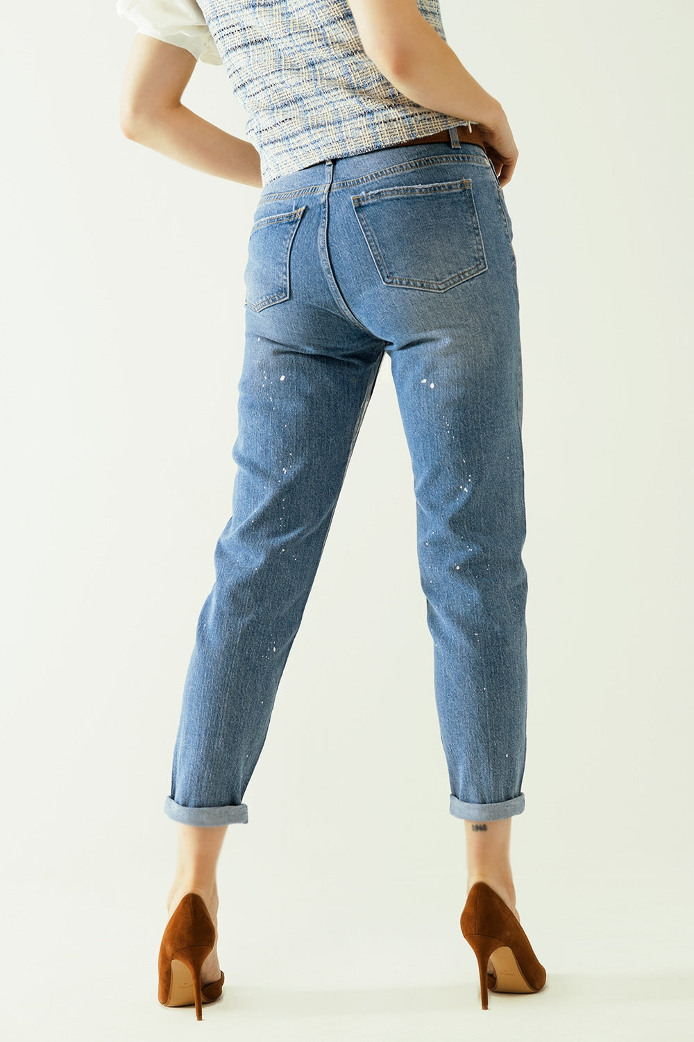 Jeans skinny blu con finitura metallica in lavaggio chiaro