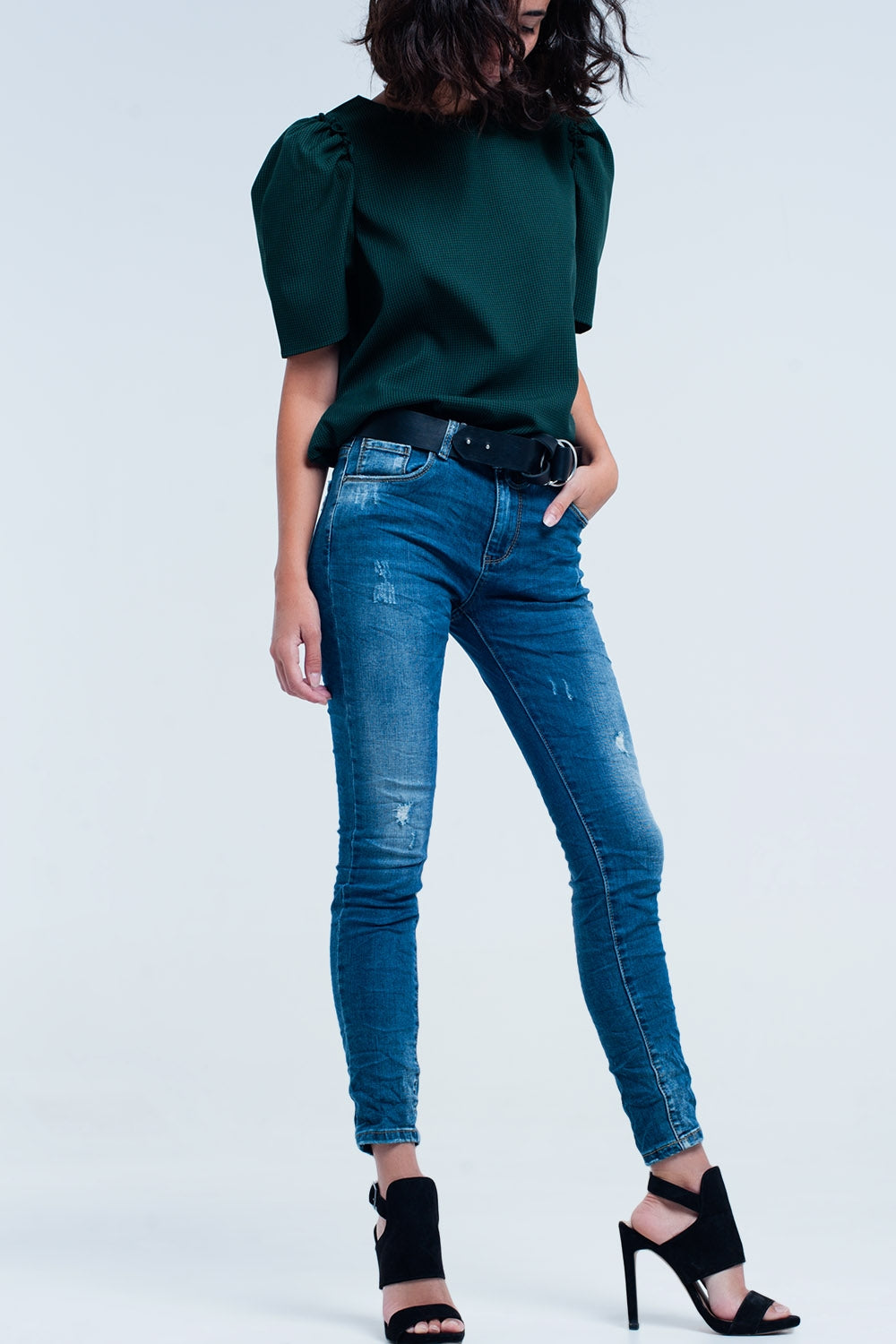 Jeans skinny blu con strappi