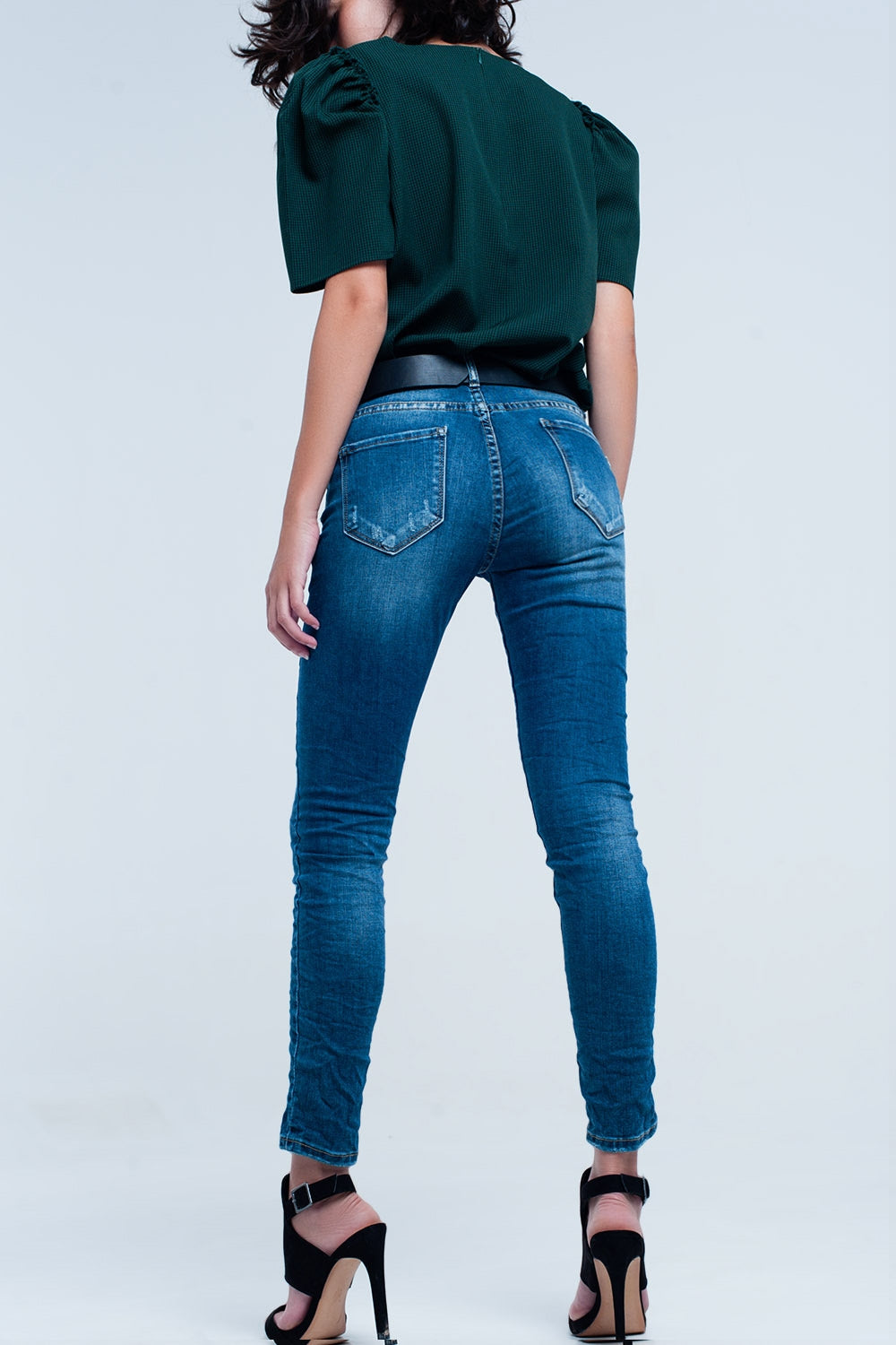 Jeans skinny blu con strappi