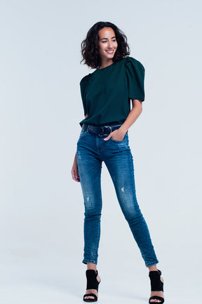 Jeans skinny blu con strappi