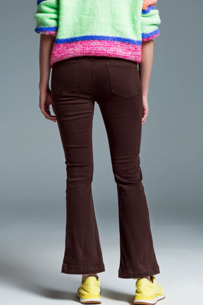 Jeans skinny svasati con doppio bottone in marrone