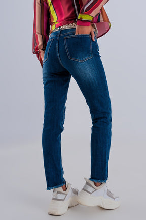 Jeans skinny vita alta con fondo grezzo blu scuro