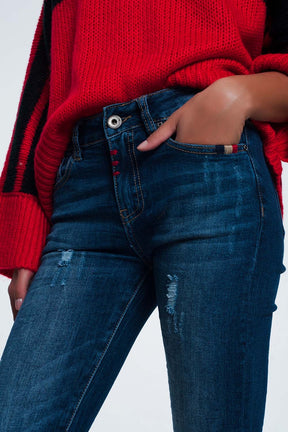 Jeans slim con dettaglio filo colorato