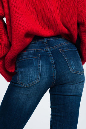 Jeans slim con dettaglio filo colorato