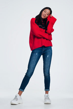 Jeans slim con dettaglio filo colorato