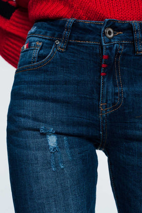 Jeans slim con dettaglio filo colorato