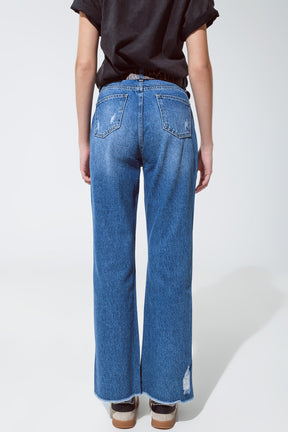 Jeans strappati a gamba dritta con bagliori metallici dorati