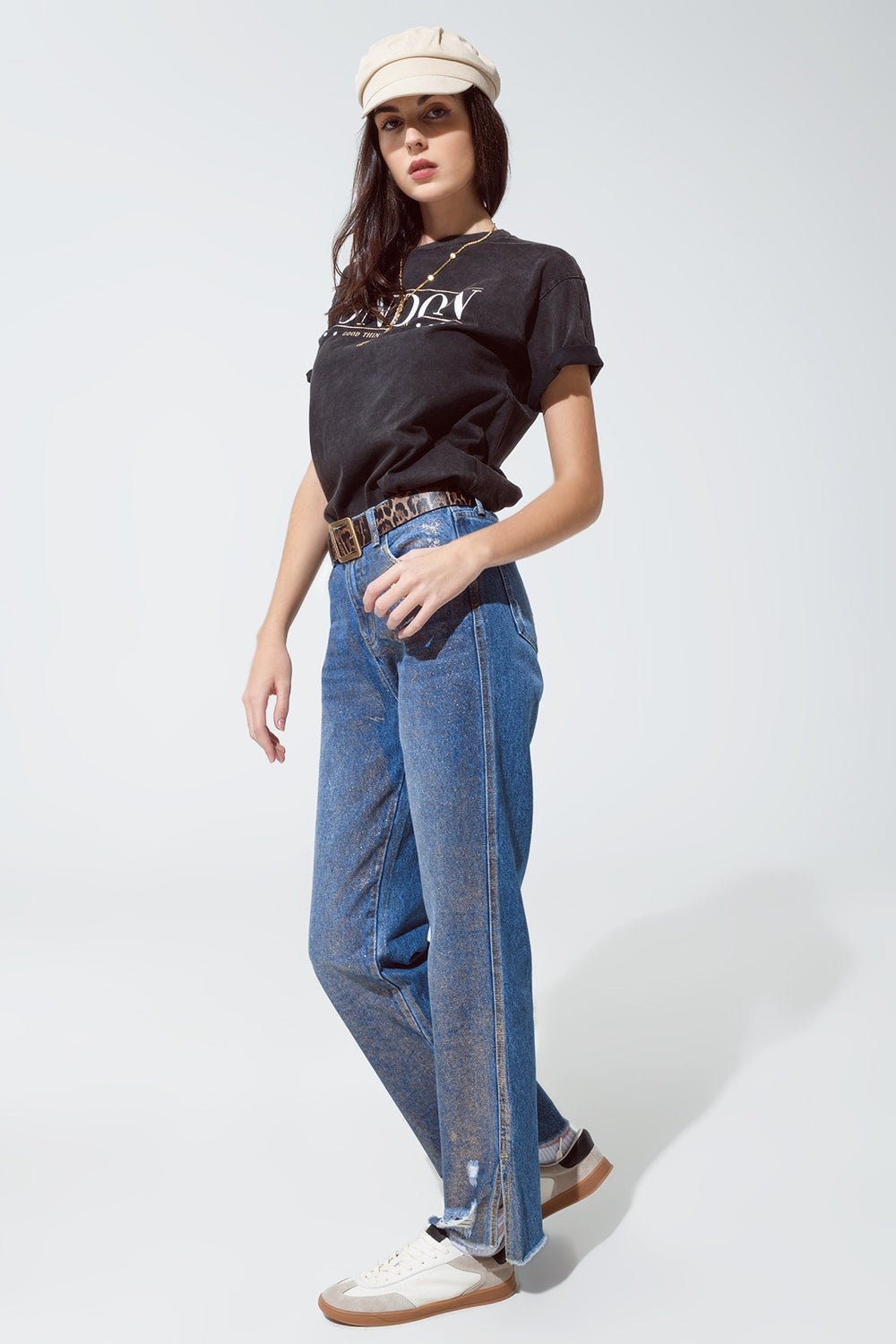 Jeans strappati a gamba dritta con bagliori metallici dorati