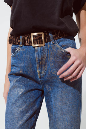Jeans strappati a gamba dritta con bagliori metallici dorati