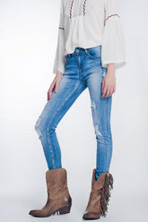 Q2 Jeans super skinny blu lavaggio vintage strappati