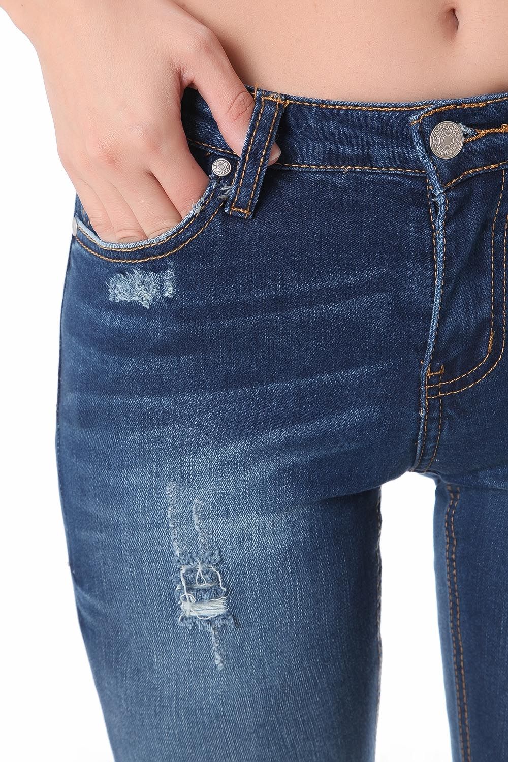 Jeans super slim con effetto strappati