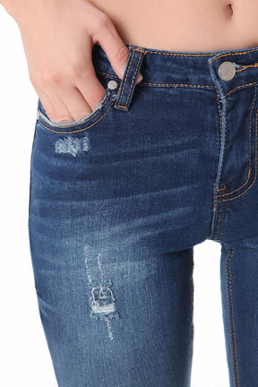 Jeans super slim con effetto strappati