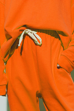 Jogger oversize con cravatta in vita in arancione brillante