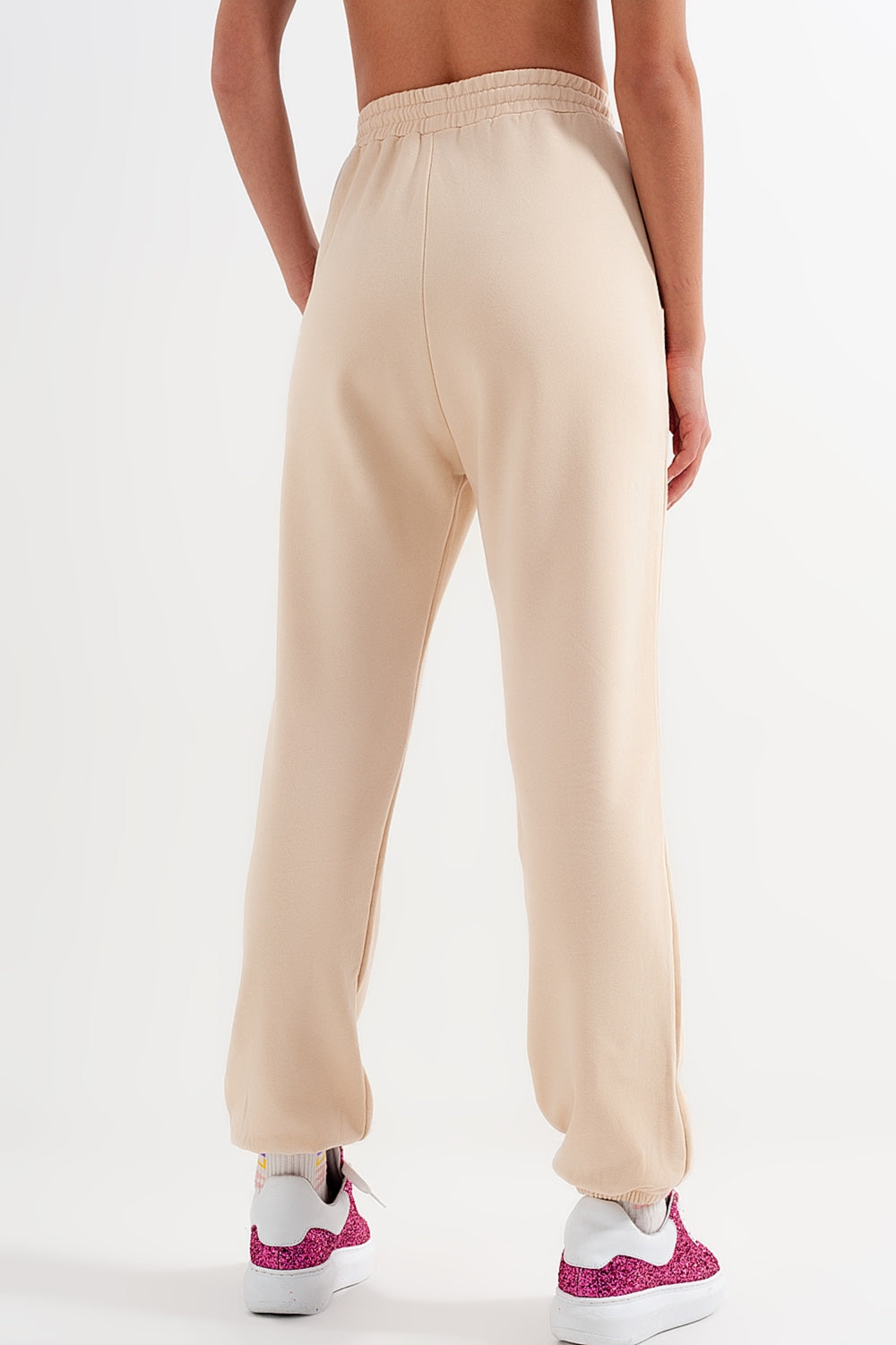 Joggers con elastico in vita in beige