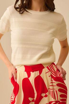 Maglia a righe testurizzate in bianco