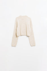 Q2 Maglia beige con maniche lunghe e dettaglio posteriore aperto