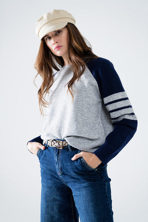 Maglia con maniche raglan bicolore in blu e grigio