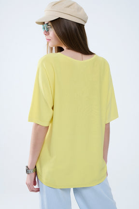 Maglia giallo oversize con maniche al gomito