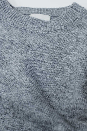 Maglia grigia a maglia morbida con maniche a palloncino