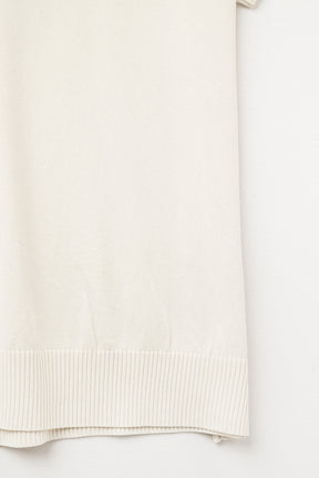 maglia polo a maglia fine in beige con maniche corte