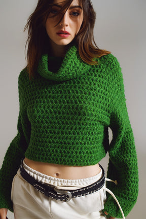 Maglione a coste con collo a dolcevita e polsini arrotolati in maglia a nido d'ape verde