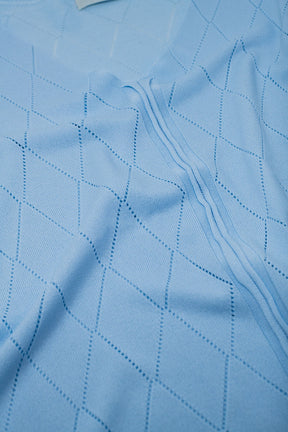 Maglione a maniche corte azzurro con motivo argyle