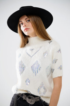 Maglione a maniche corte color crema con paillettes