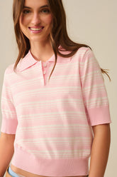 Q2 Maglione a righe bianche e rosa con collo a polo
