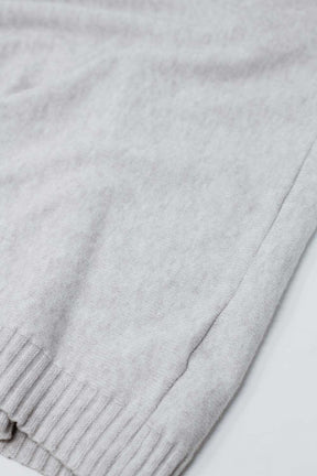 Maglione beige con maniche aderenti