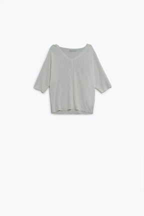 Q2 Maglione bianco a maniche corte con motivo argyle