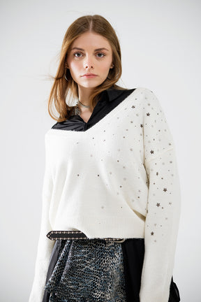 Maglione con scollo a V impreziosito da stelle metalliche
