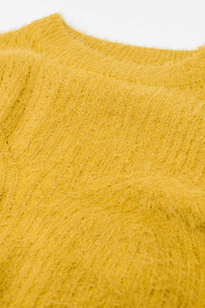 Maglione cropped con dettagli di cucitura in giallo