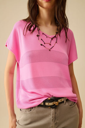 Maglione fucsia con scollo a V e dettaglio punto a giorno
