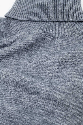 Maglione grigio con maniche scese